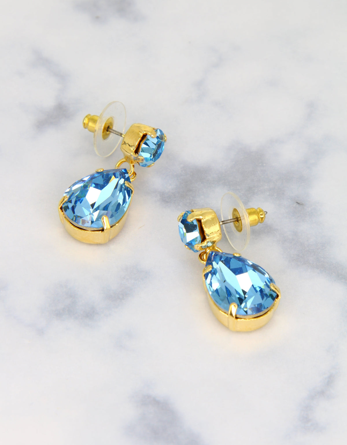statement wedding jewellery for the brides blue crystal earrings