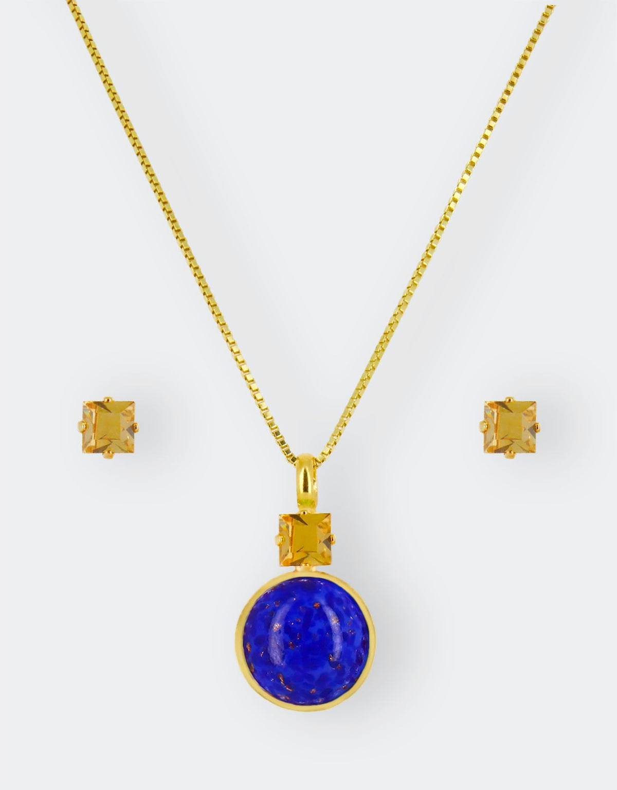 blue pendant and golden crystal earrings a perfect gift set for her