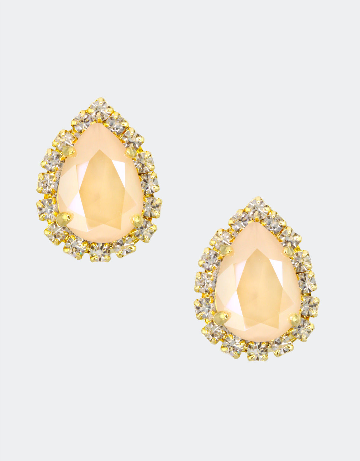 cream crystal earrings with golden plating
