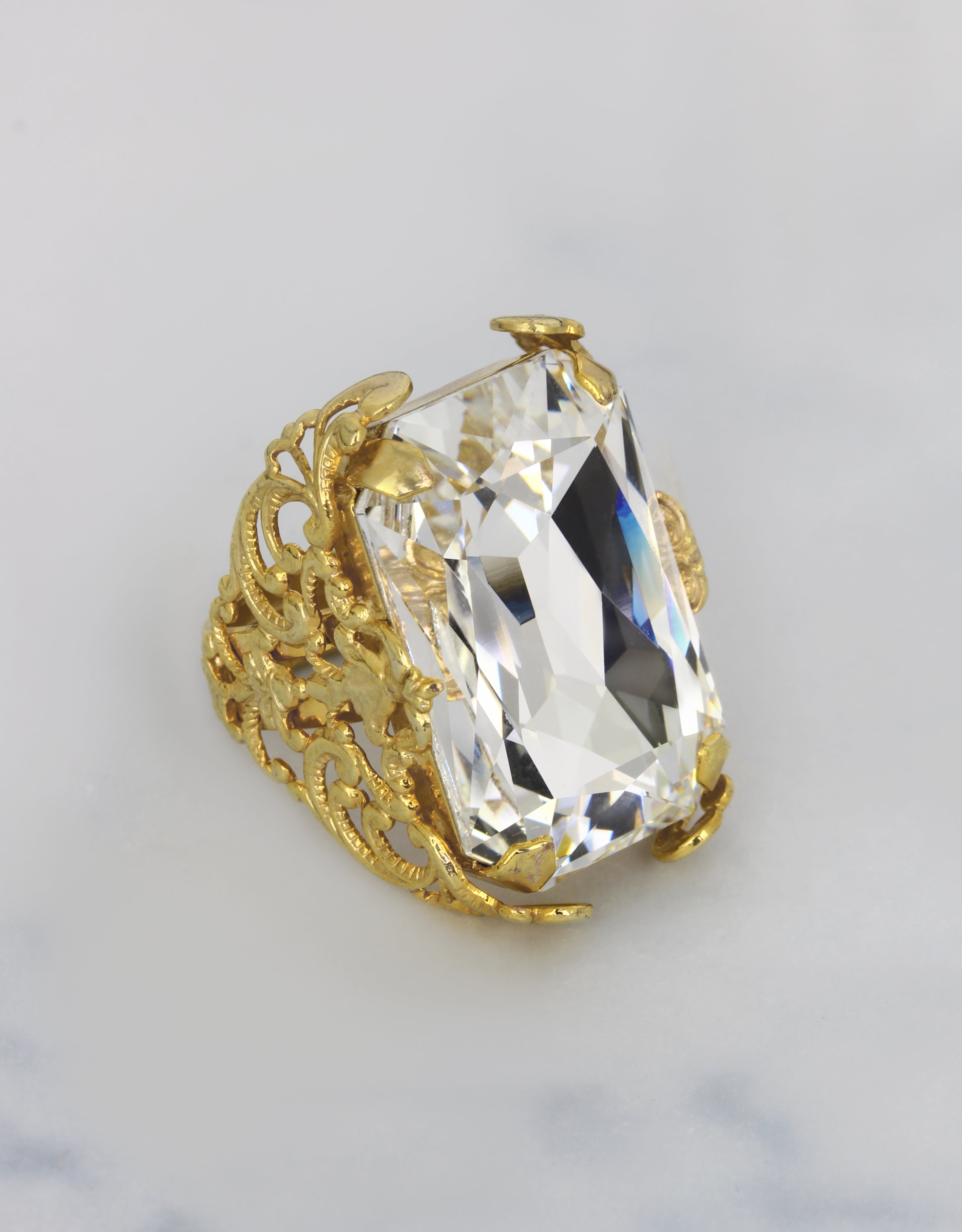 gold plated statement ring with adjustable band for evening soiree