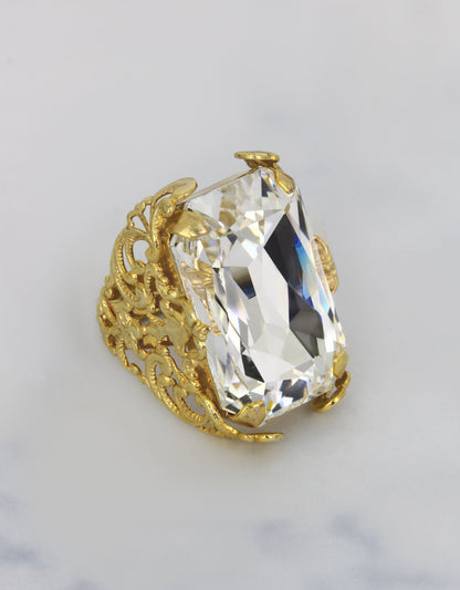 gold plated statement ring with adjustable band for evening soiree