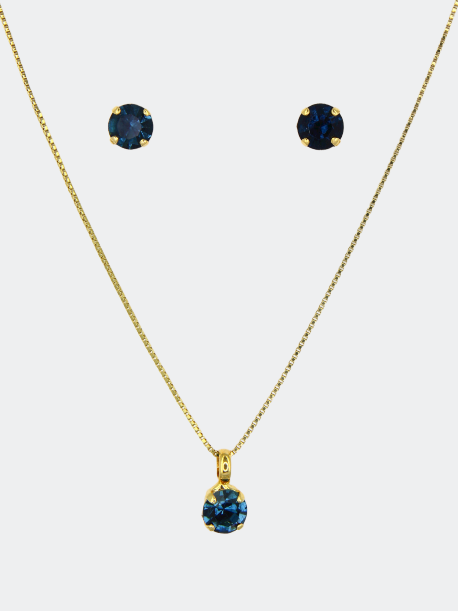 A set of crystal earrings and a matching necklace with a solitaire pendant for V-neck dress