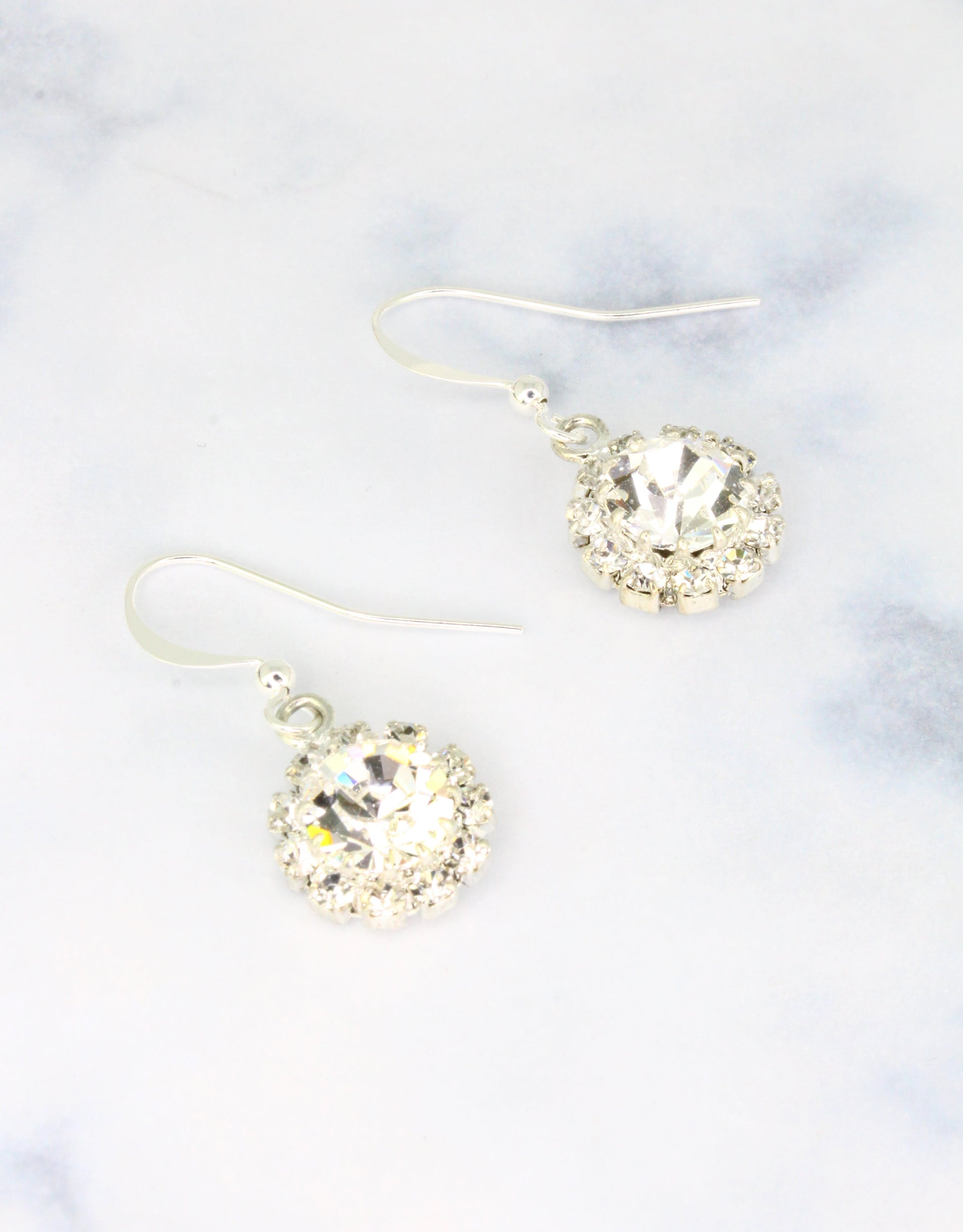 Selene Crystal June Hanging Rosetta drop earrings in jet black crystal with gold hook – sleek handcrafted earrings with sophisticated dark brilliance for evening and minimalist styling.

