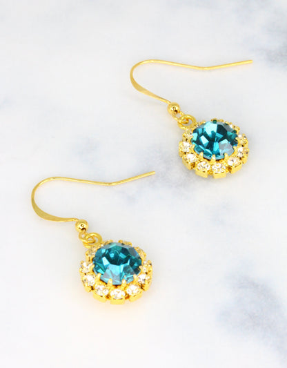 Selene Crystal June Hanging Rosetta earrings in clear crystal with silver hook – classic handcrafted drop earrings with pure brilliant sparkle for any occasion. Free worldwide shipping on orders over £199.