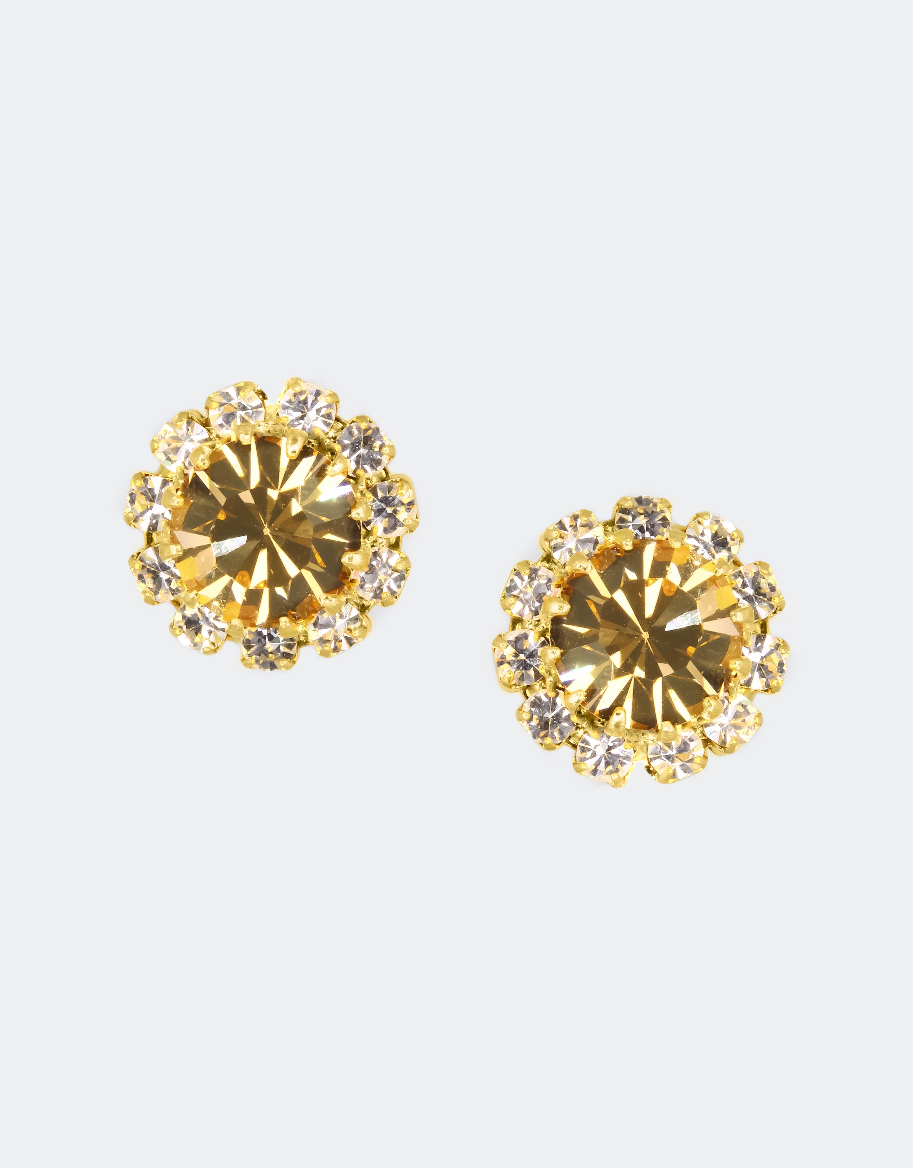 Selene Crystal June Rosetta stud earrings in champagne and gold crystal – handcrafted round crystal studs loved worldwide, perfect for everyday wear or paired with a bold necklace. Free worldwide shipping on orders over £199.