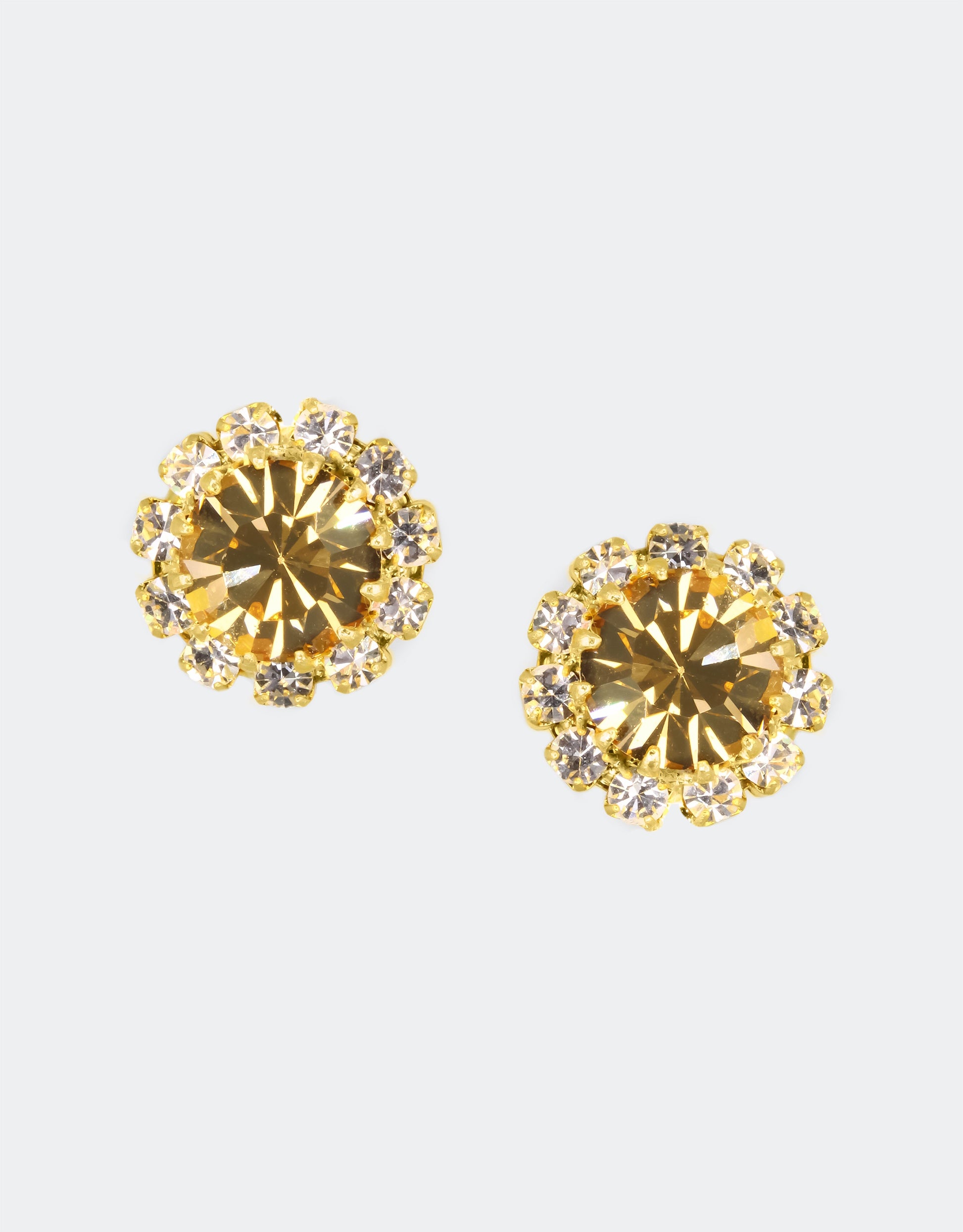 Selene Crystal June Rosetta stud earrings in champagne and gold crystal – handcrafted round crystal studs loved worldwide, perfect for everyday wear or paired with a bold necklace. Free worldwide shipping on orders over £199.