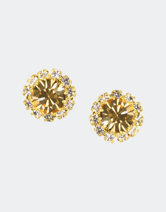 Selene Crystal June Rosetta stud earrings in champagne and gold crystal – handcrafted round crystal studs loved worldwide, perfect for everyday wear or paired with a bold necklace. Free worldwide shipping on orders over £199.