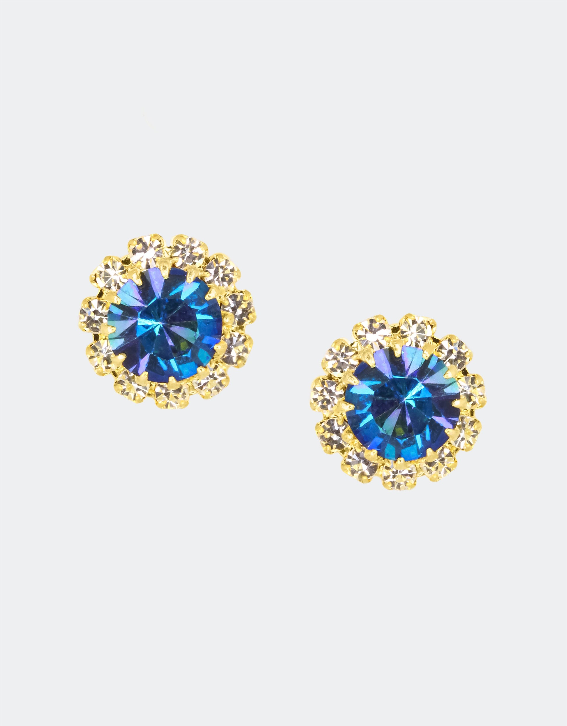 Selene Crystal June Rosetta stud earrings in cobalt blue crystal with gold halo – bold handcrafted round studs perfect for adding colour to everyday looks and special occasions. Free worldwide shipping on orders over £199.