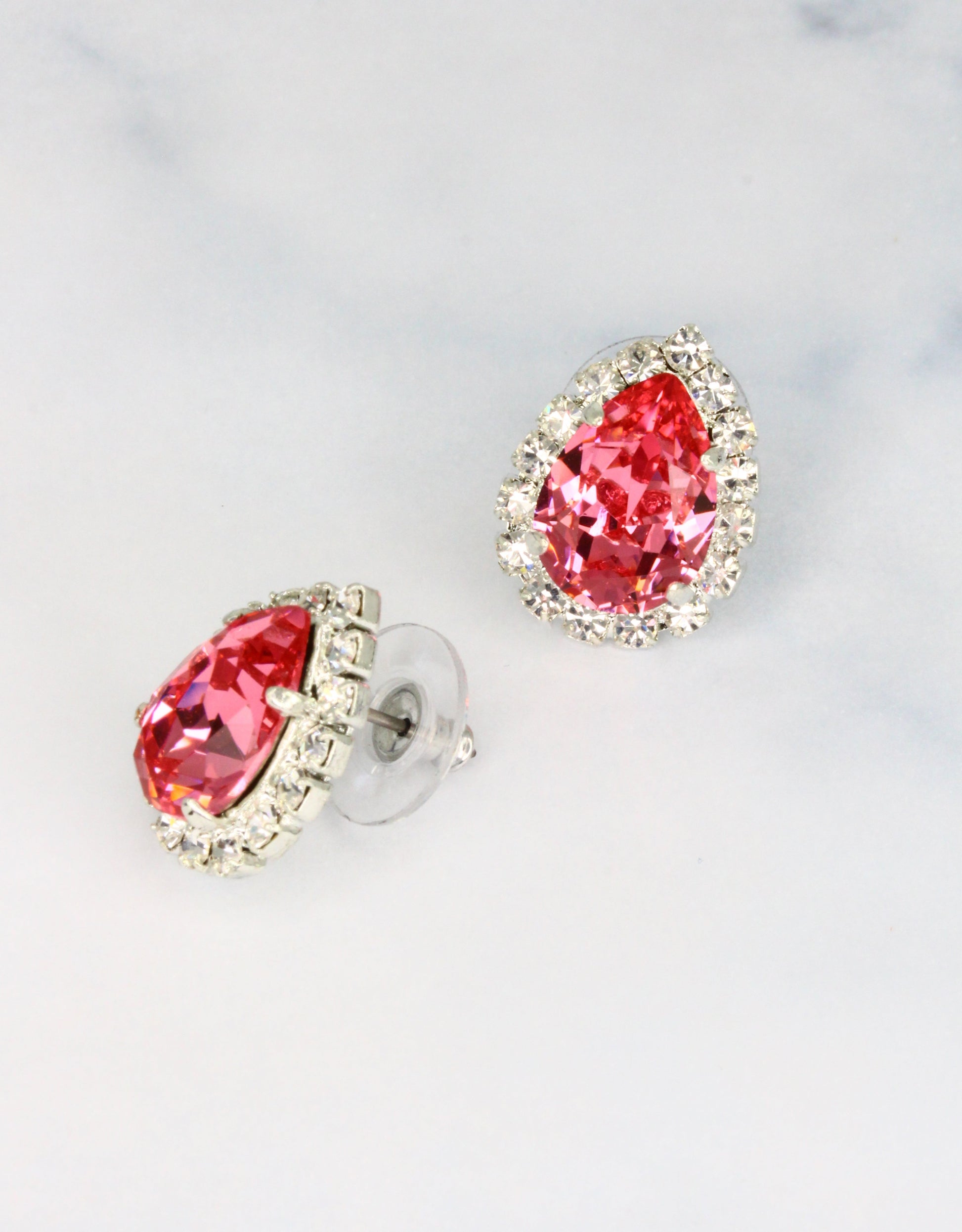 Selene Crystal Lily Pear Rosetta studs in rose pink crystal with silver setting – a timeless bestselling pear-shaped stud earring with fine crystal halo detailing.