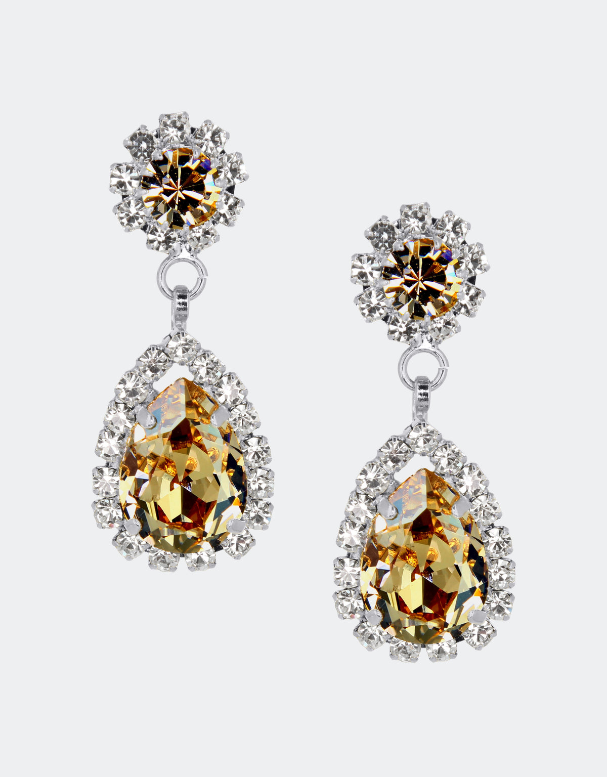Selene Crystal Rosa drop earrings in deep topaz yellow and crystal – round and pear-shaped design with a striking green sparkle that adds dramatic glamour to any outfit.