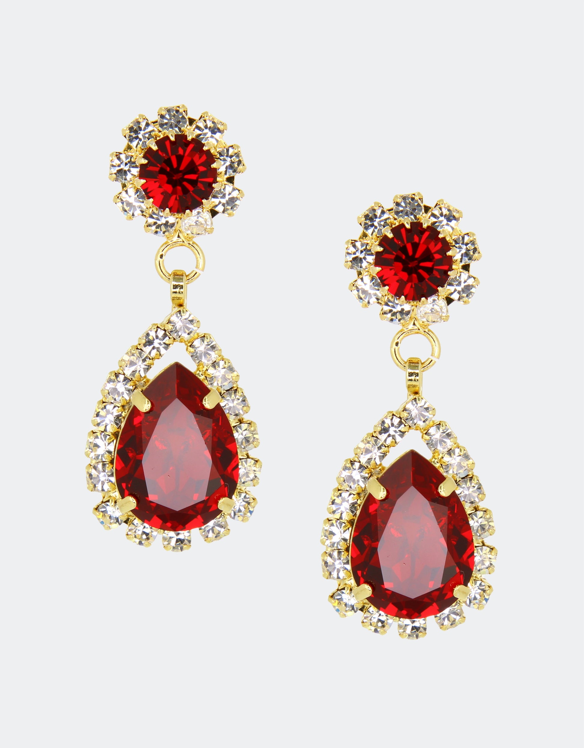 Selene Crystal Rosa drop earrings in ruby red crystal with gold setting – bold pear-shaped and round crystal design with dramatic sparkle for parties and special occasions. Free worldwide shipping on orders over £199.