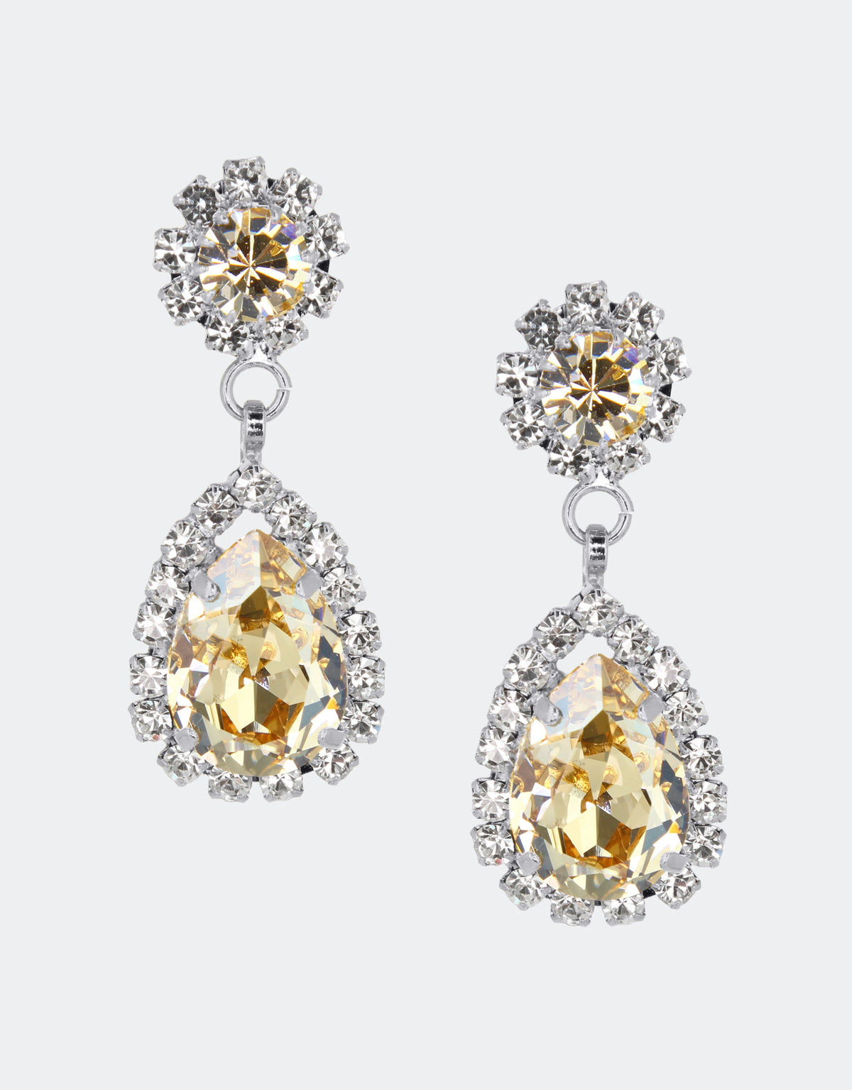 Selene Crystal Rosa drop earrings in teal crystal with gold setting – striking pear-shaped handcrafted jewellery with rich oceanic sparkle for parties and special occasions. Free worldwide shipping on orders over £199.