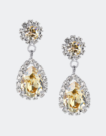 Selene Crystal Rosa drop earrings in teal crystal with gold setting – striking pear-shaped handcrafted jewellery with rich oceanic sparkle for parties and special occasions. Free worldwide shipping on orders over £199.