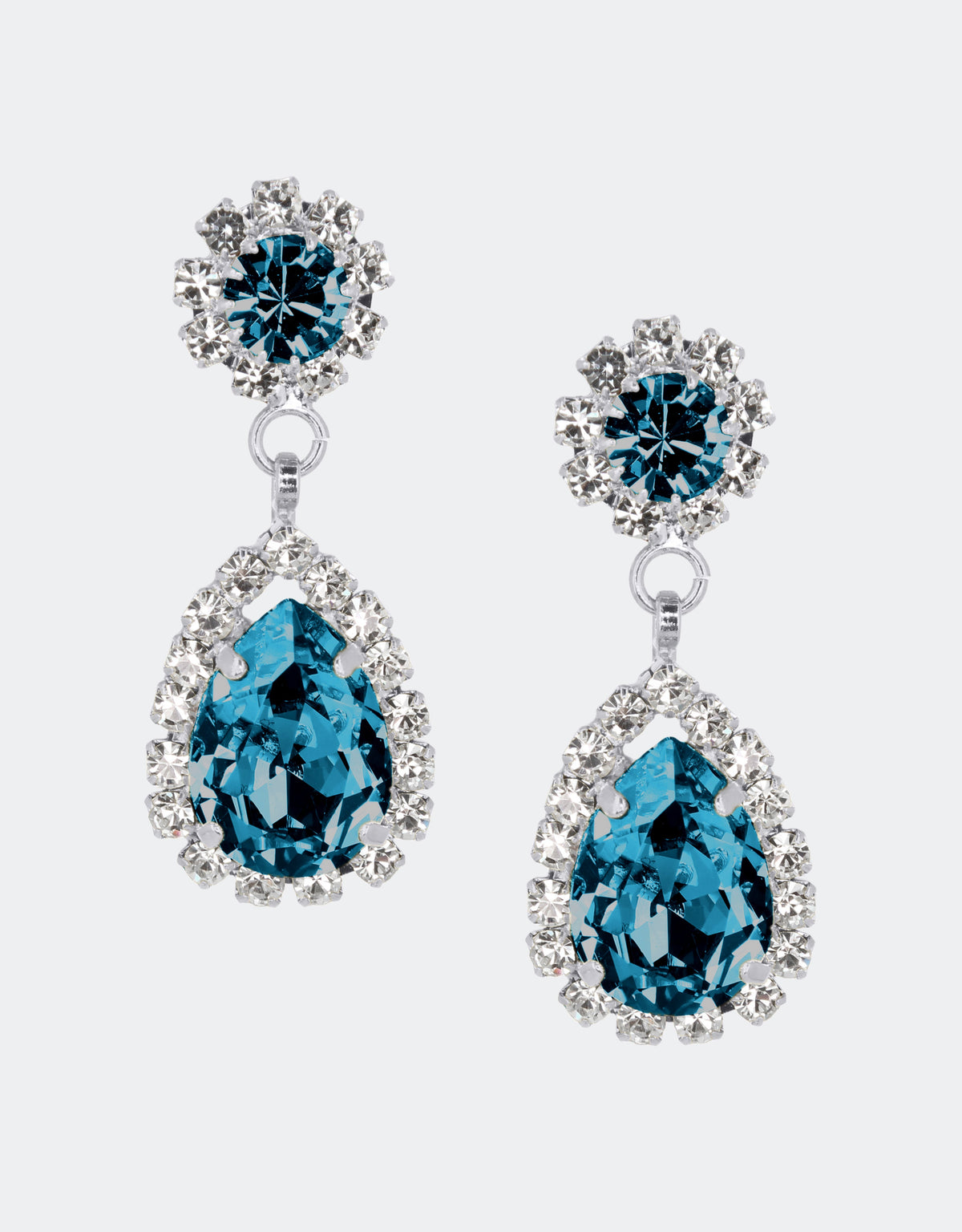 Selene Crystal Rosa pear drop earrings in cobalt blue crystal with silver setting – bold handcrafted jewellery with deep ocean-toned sparkle for refined occasion and evening styling.