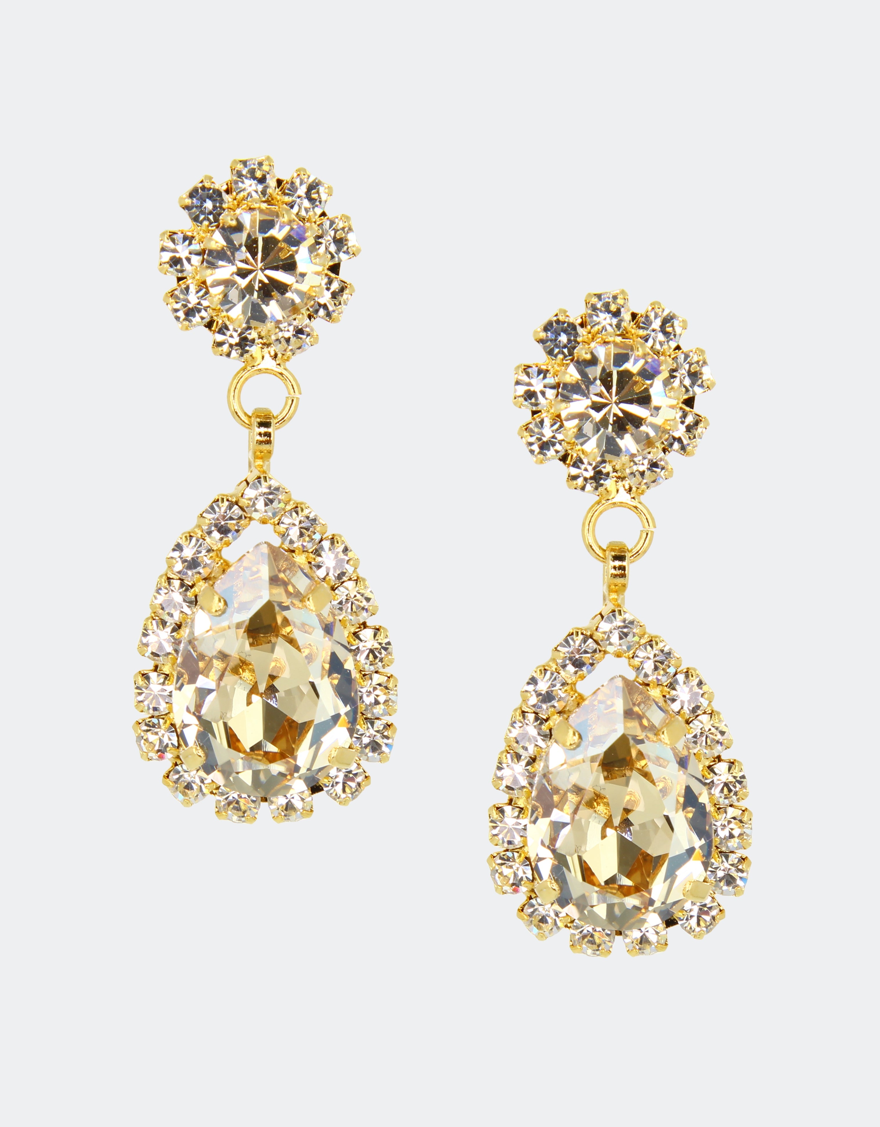 Selene Crystal Rosa pear drop earrings in pale champagne crystal with silver setting – delicate handcrafted jewellery with soft golden sparkle for bridal, everyday and evening wear. Free worldwide shipping on orders over £199.