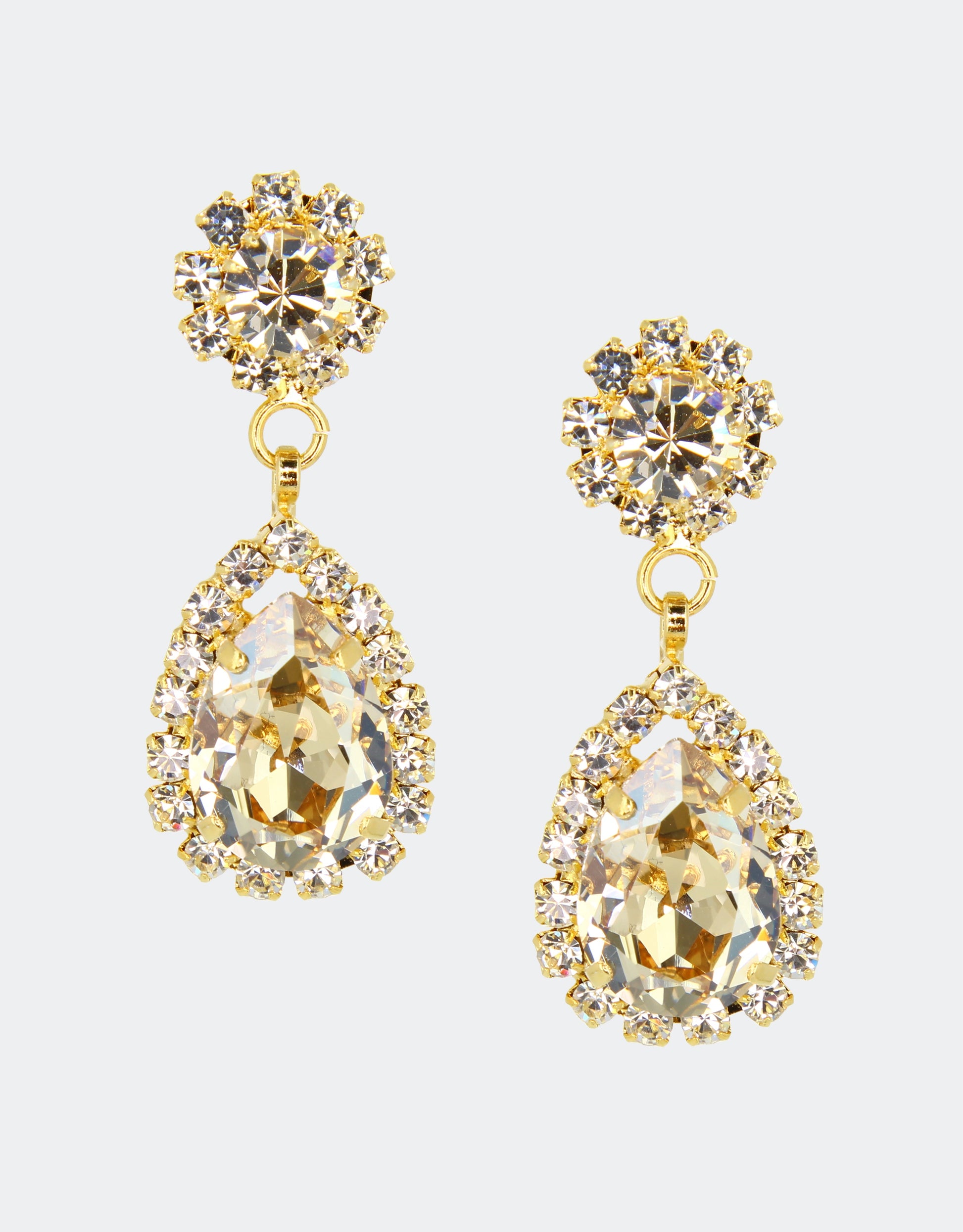 Selene Crystal Rosa pear drop earrings in pale champagne crystal with silver setting – delicate handcrafted jewellery with soft golden sparkle for bridal, everyday and evening wear. Free worldwide shipping on orders over £199.