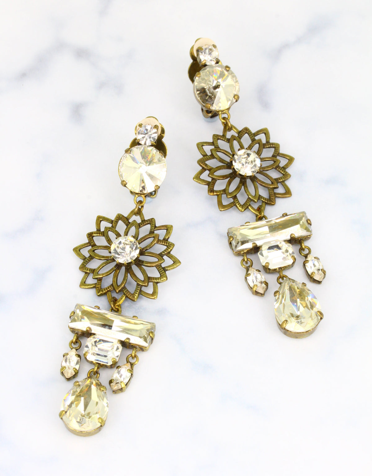 a fine european bridal jewellery white dangle earrings with unique flower design