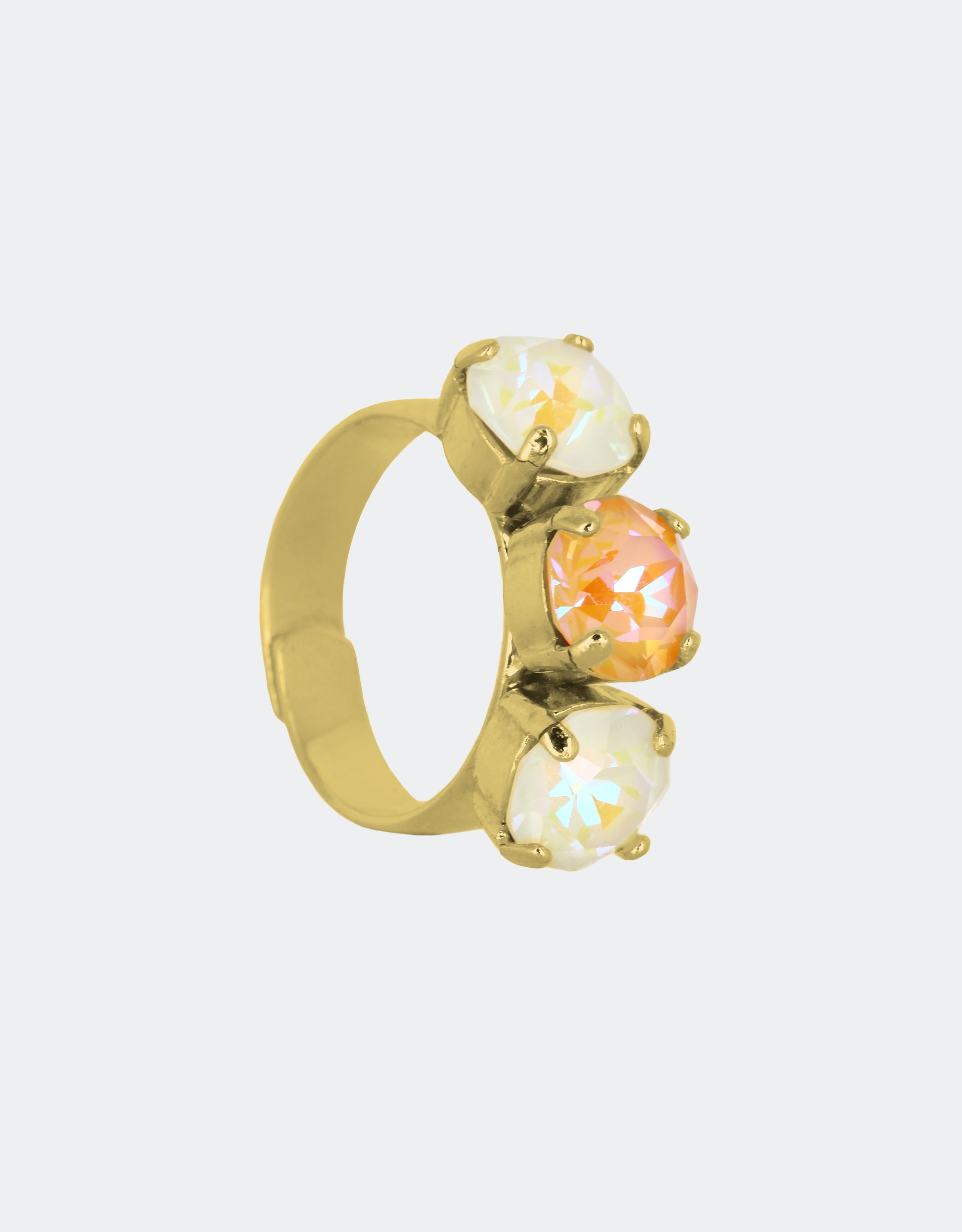 a simple and unique ring for your girlfriend with white and peach crystals